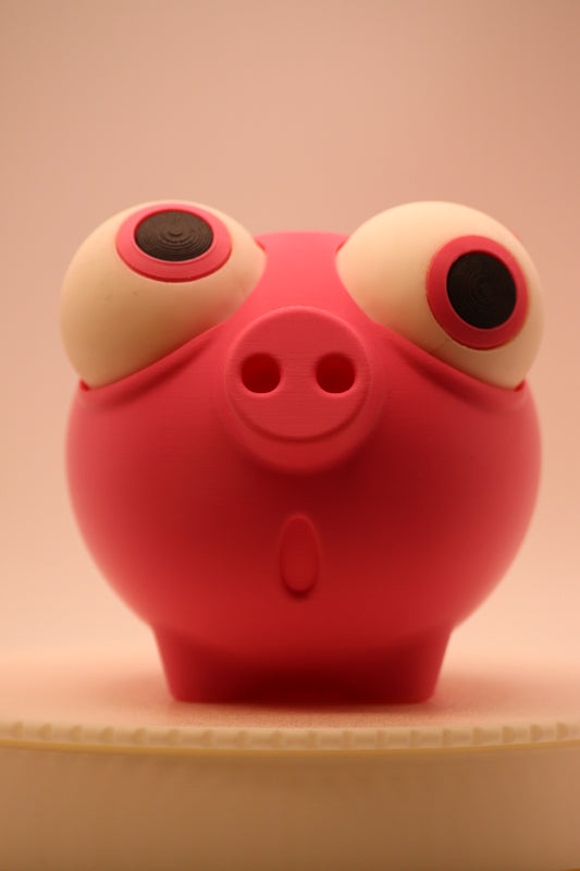 Mealheiro porco rosa impresso em 3D com olhos grandes